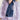 Purple sequin coat with wave-inspired ruffle details and traditional Chinese stand collar, elegant outerwear blending cultural heritage with modern sophistication.