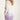 Purple sequined skirt with sculptural movement, sleek finish inspired by the elegance of traditional Chinese ceremonial garments.