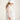 Women's white organza blazer with classic minimalist silhouette, inspired by Chinese tradition, elegant and timeless layering piece.