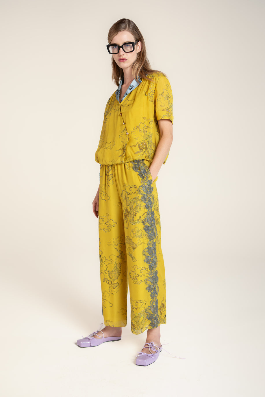 PANTALONI CON STAMPA DRAGO