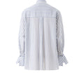 Women's blue and white striped cotton shirt with intricate Miao embroidery, contemporary design inspired by traditional craftsmanship.