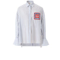 Women's blue and white striped cotton shirt with intricate Miao embroidery, contemporary design inspired by traditional craftsmanship.