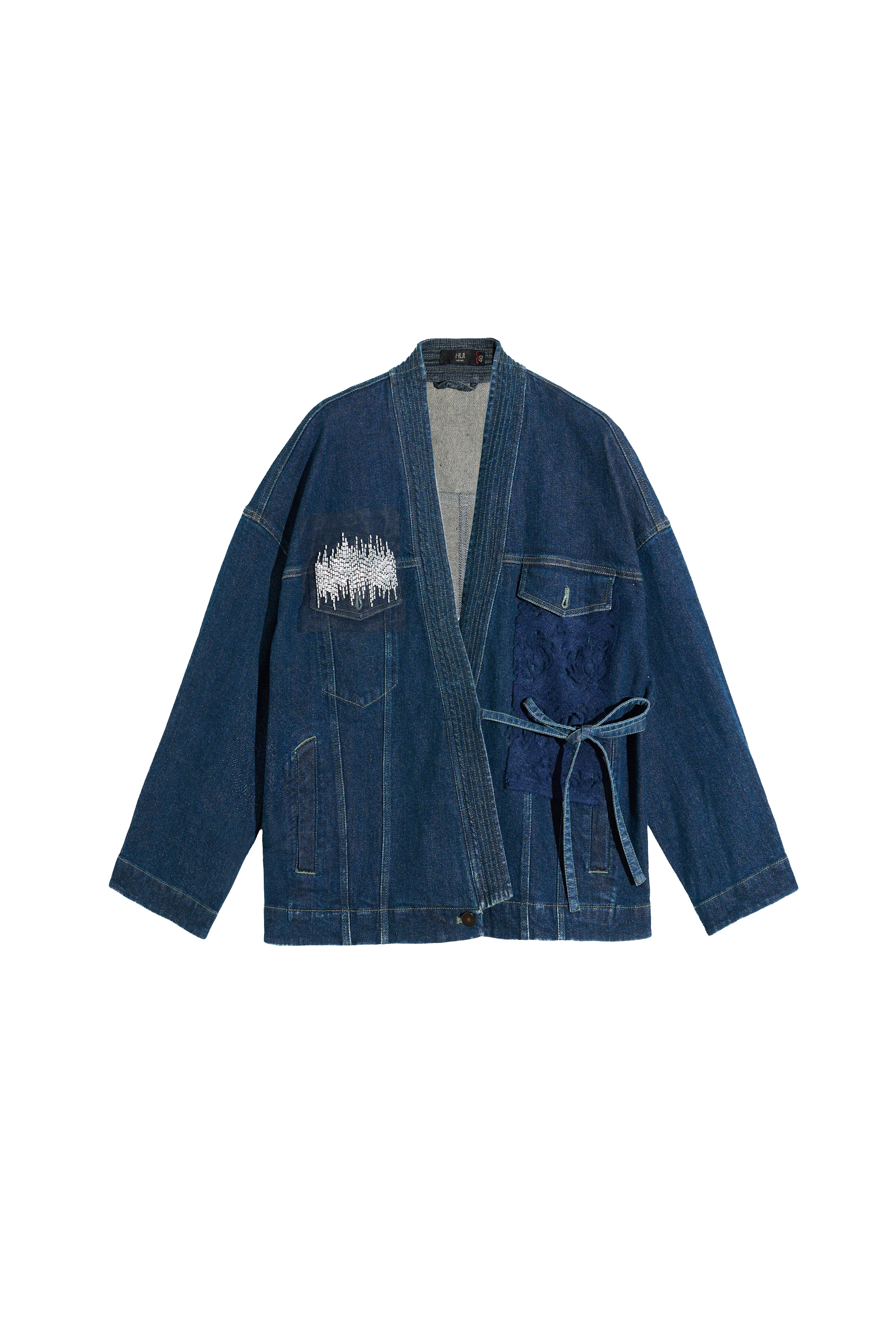 Hui Milano dark blue denim Chinese-style double-breasted jacket with side pockets, sequins and embroidered pipe bead details, blending elegance and contemporary style, front view on white background.