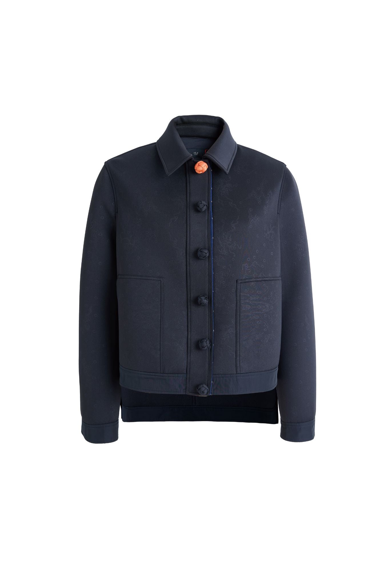 Hui Milano dark blue jacket with collar, front closure with decorative knotted buttons, embossed texture, and large chest pockets, combining traditional Chinese-inspired design with elegant structure, front view on white background.
