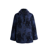 Hui Milano dark blue corduroy velvet Chinese-style jacket with chenille jacquard pattern, hand-beaded details, fur collar, button closure, and side pockets, vintage-inspired elegant design, front view on white background.