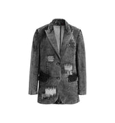 Hui Milano dark grey denim jacket with classic formal cut, featuring rips, patches, tube bead embroidery, and snowflake wash effect, casual yet sophisticated urban-inspired style, front view on white background.