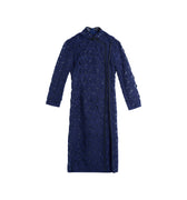 Hui Milano long blue qipao with classic high Chinese collar, knot buttons, and black side lines shaping the silhouette, crafted from mohair lace with three-dimensional motifs for romantic and feminine elegance, front view on white background.