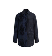 Hui Milano long-sleeve patchwork jacket with dark blue floral motifs on one side and dark grey dragon embroidery on the other, lapel collar, front button closure, hand-bound beads, and seawater embroidery, elegant and culturally inspired design, front view on white background.