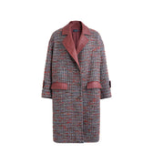 Hui Milano mid-length multicolor tweed coat with lapel collar and Xiangyun silk inserts on collar, cuffs, and pocket trims, elegant material contrast blending structured vintage tweed with light silk, sophisticated and modern design, front view on white background.