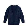 Hui Milano oversized navy blue cardigan with soft lines and minimalist elegant design, versatile for sophisticated day-to-evening outfits, front view on white background.