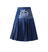 Hui Milano pleated denim A-line skirt with embroidered waist panel featuring traditional Chinese motifs of waves and florals, classic cloud embroidery, elegant and heritage-inspired design, front view on white background.