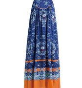 Hui Milano sleeveless long deep blue silk dress with refined mythological motifs, orange waistband and hem creating striking contrast, elegant and artistic design, front view on white background.