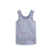Hui Milano sleeveless tank top fully embroidered with traditional Miao motifs in blue tones, featuring knit shoulder inserts for comfort and sporty touch, unique blend of ethnic aesthetics and contemporary style, front view on white background.