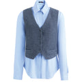 Hui Milano two-in-one outfit featuring grey wool V-neck waistcoat with single buttons and pockets, paired with blue silk shirt with collar and long sleeves, versatile and sophisticated layered look, front view on white background.