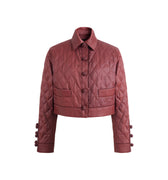 Hui Milano Xiangyun cropped jacket in cotton-silk blend with lapel collar, diamond stitching, traditional Chinese knot buttons on front and cuffs, and functional side pockets, elegant and refined design with lightweight warmth, front view on white background.