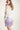 Purple sequined skirt with sculptural movement, sleek finish inspired by the elegance of traditional Chinese ceremonial garments.