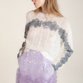 Purple sequined skirt with sculptural movement, sleek finish inspired by the elegance of traditional Chinese ceremonial garments.