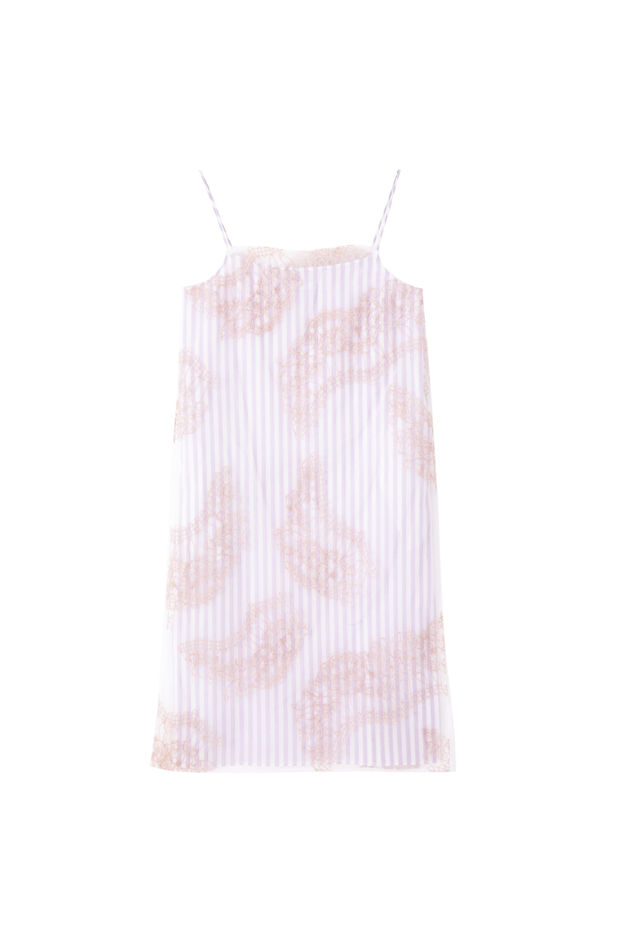 Purple slip dress with sheer fabric and intricate lace-inspired pattern, flowing silhouette influenced by Chinese motifs and modern craftsmanship.