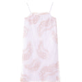 Purple slip dress with sheer fabric and intricate lace-inspired pattern, flowing silhouette influenced by Chinese motifs and modern craftsmanship.