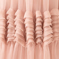 Muted pink wave dress with soft cascading layers, fluid silhouette inspired by water movement, feminine and serene design.
