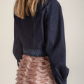 Flowing midi-length wavy skirt with wave-like ruffle trim and delicate embroidery, modern design inspired by Chinese heritage.