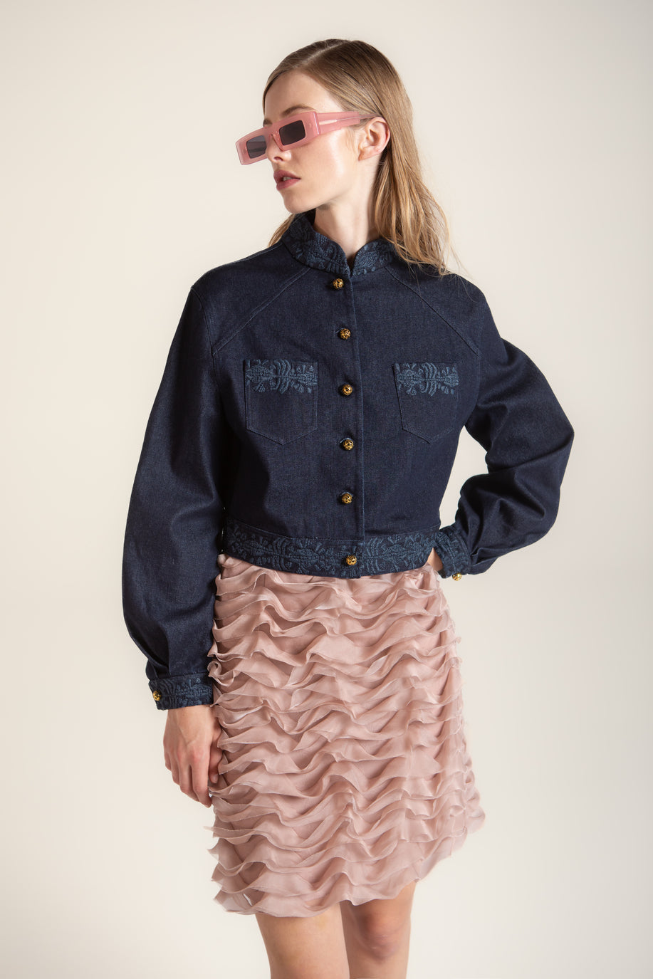 Flowing midi-length wavy skirt with wave-like ruffle trim and delicate embroidery, modern design inspired by Chinese heritage.