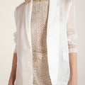 Women's white organza blazer with classic minimalist silhouette, inspired by Chinese tradition, elegant and timeless layering piece.